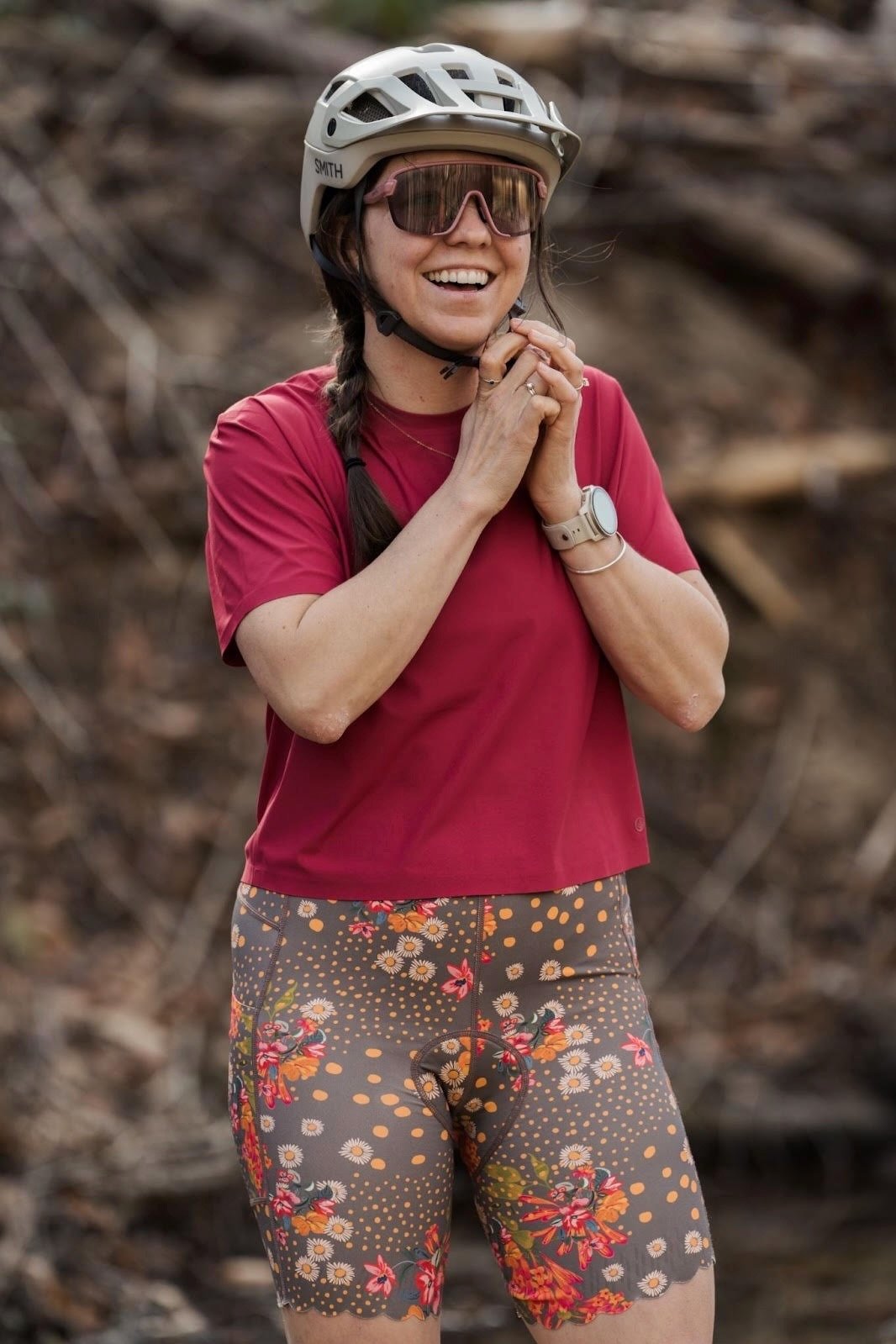 a female rider wearing Shredly gear, including the Bike Cham 2.0 in the Flora Clay color