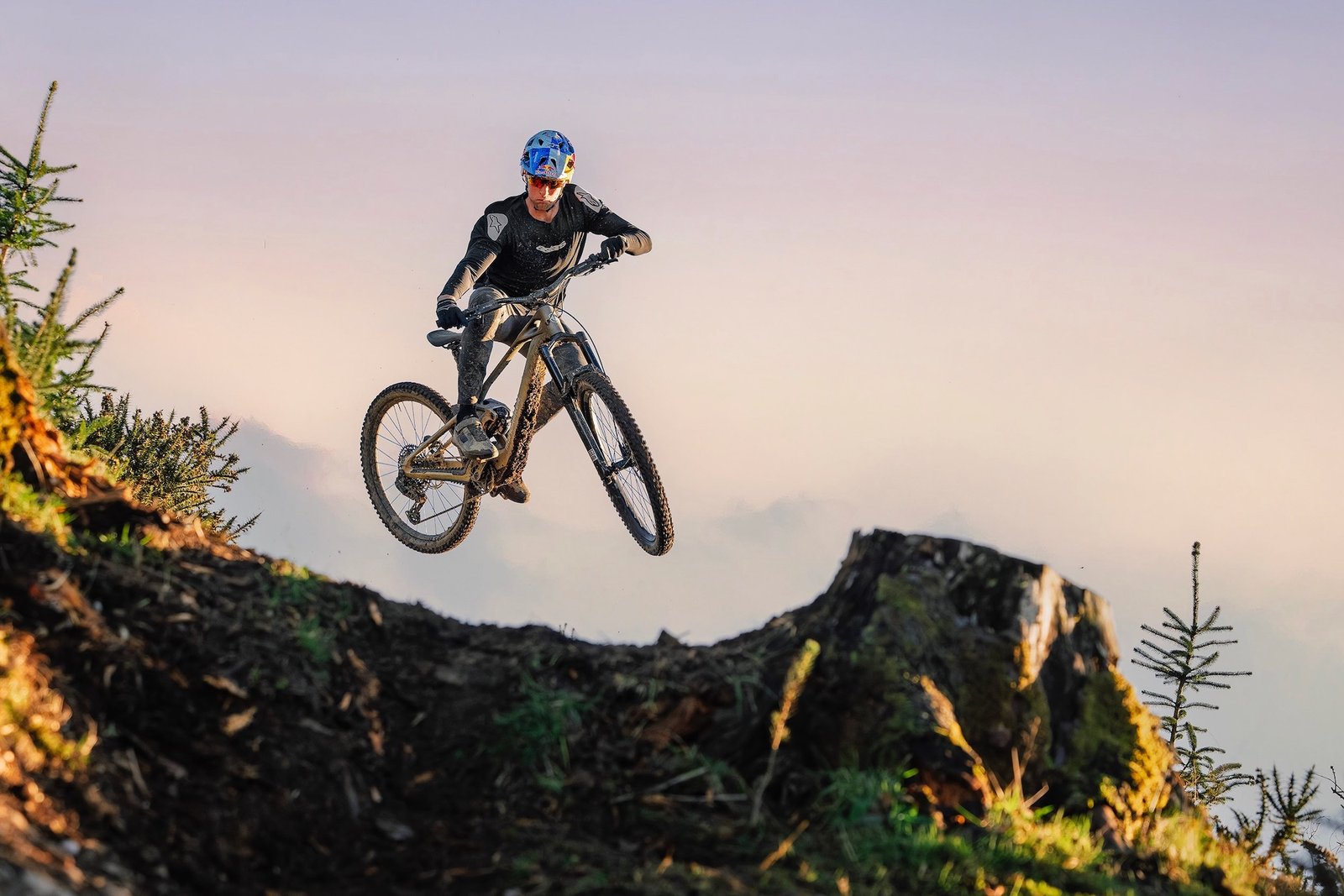 a rider on the ZENDIT eMTB hitting a jump