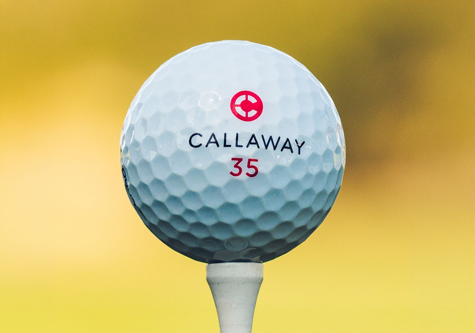 Callaway Chrome Tour X Retro Golf ball on a tee