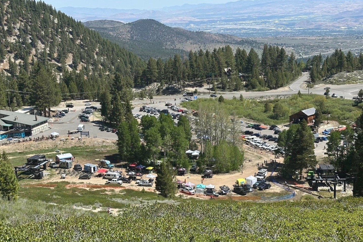 overlooking Sky Tavern's base area and parking lot, with Reno in the distance. 