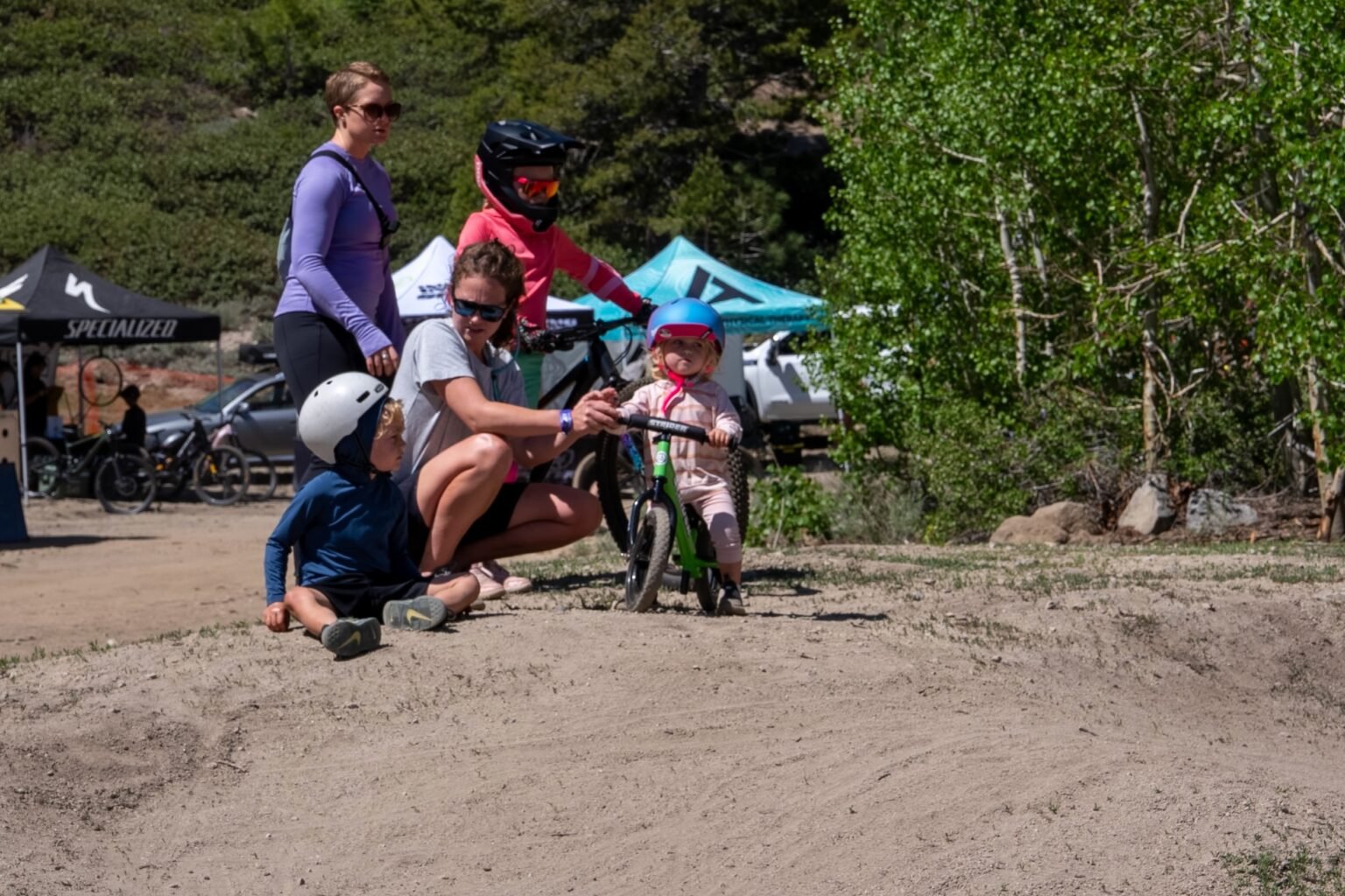 Kids and parents at the strider zone at the sky tavern bike park