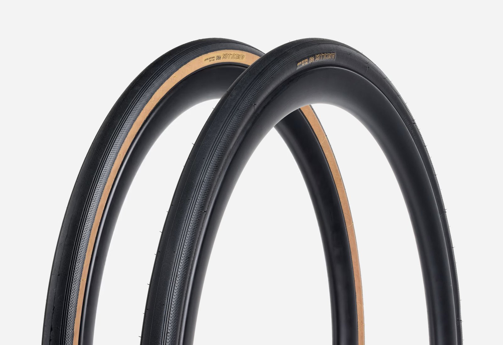 two versions of the bontrager aeolus pro tlr road bike tire.