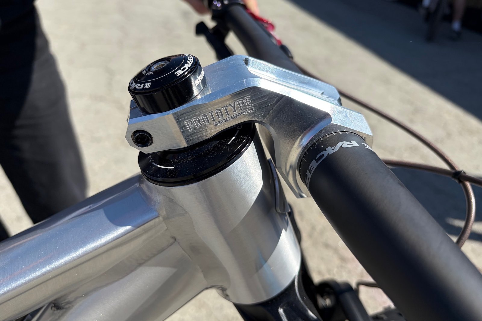 the aggresively dropped stem on the Ari Signal Peak prototype 32" mountain bike at Sea Otter.