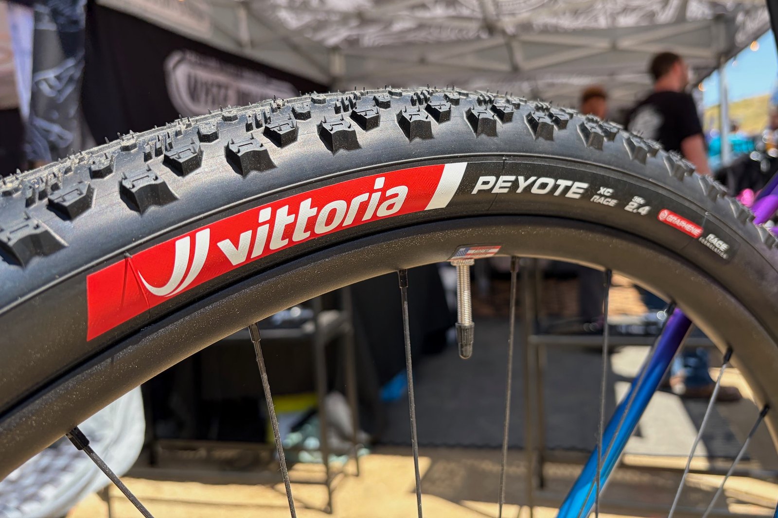 picture of the vittoria peyote 32" tires on the Sour bike in the White Industries booth.