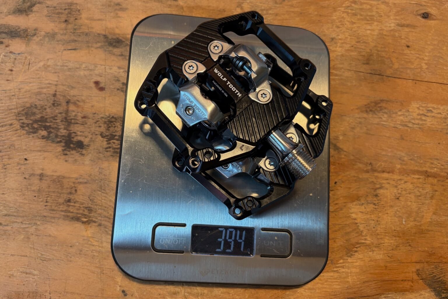 wolf tooth shift pedals on a scale, without cleats.