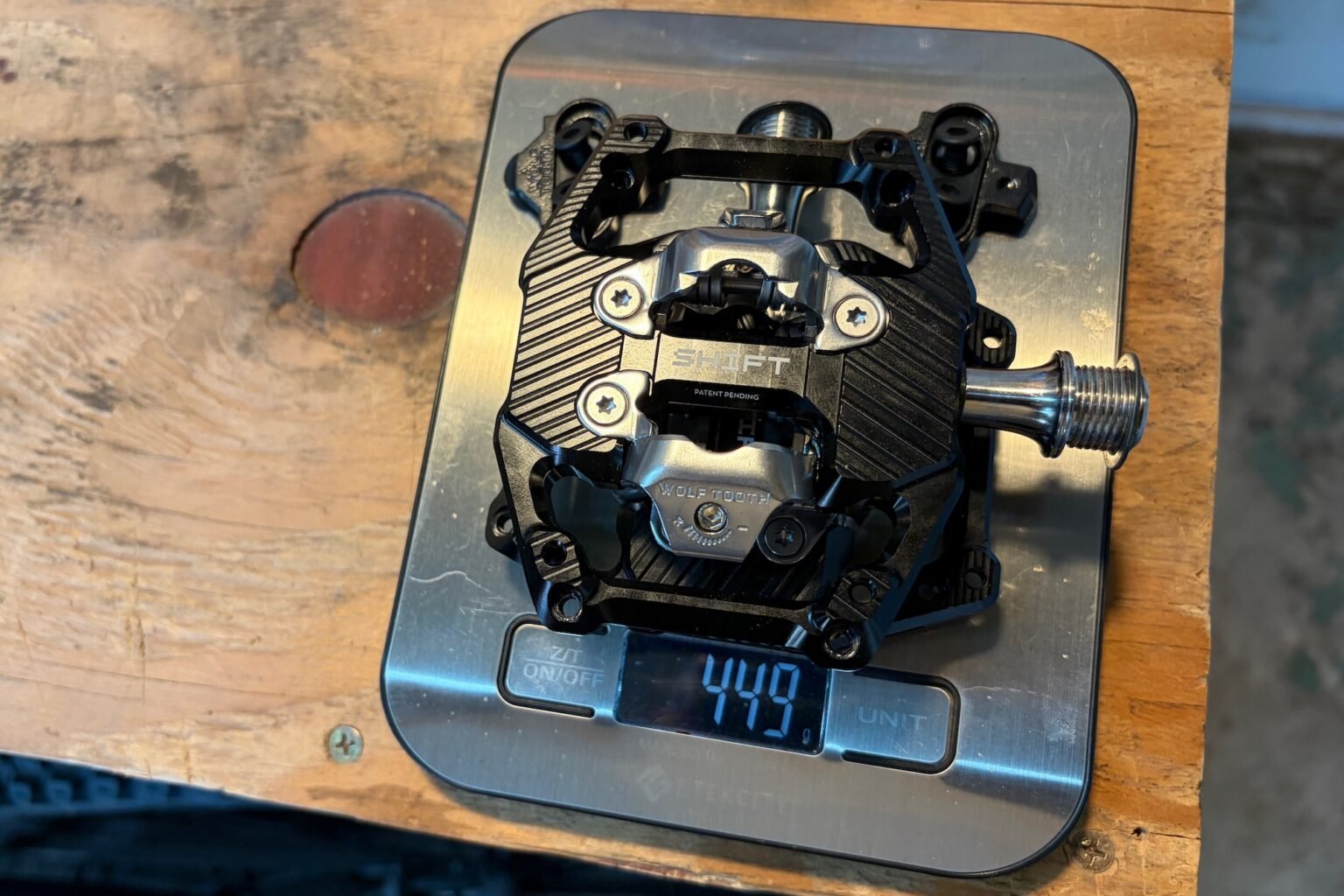 the Wolf Tooth Shift pedals on a scale with cleats