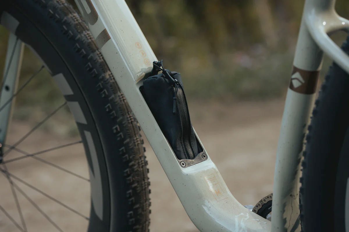 ari cache tool pouch inside downtube storage compartment.