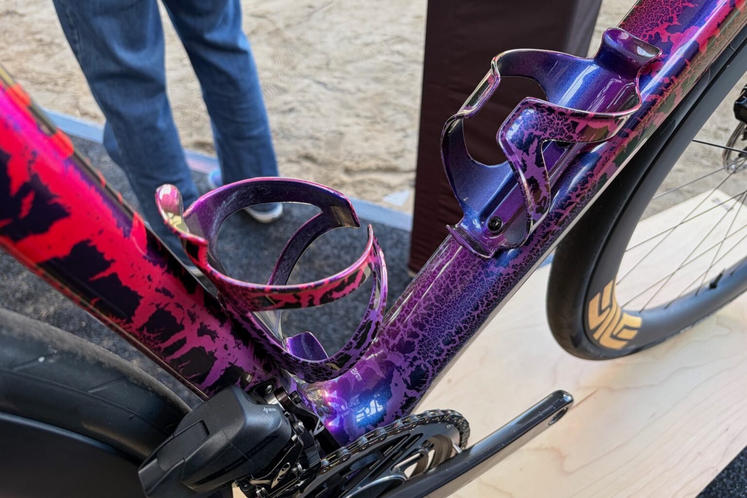 the custom painted Enve bike's bottle cages