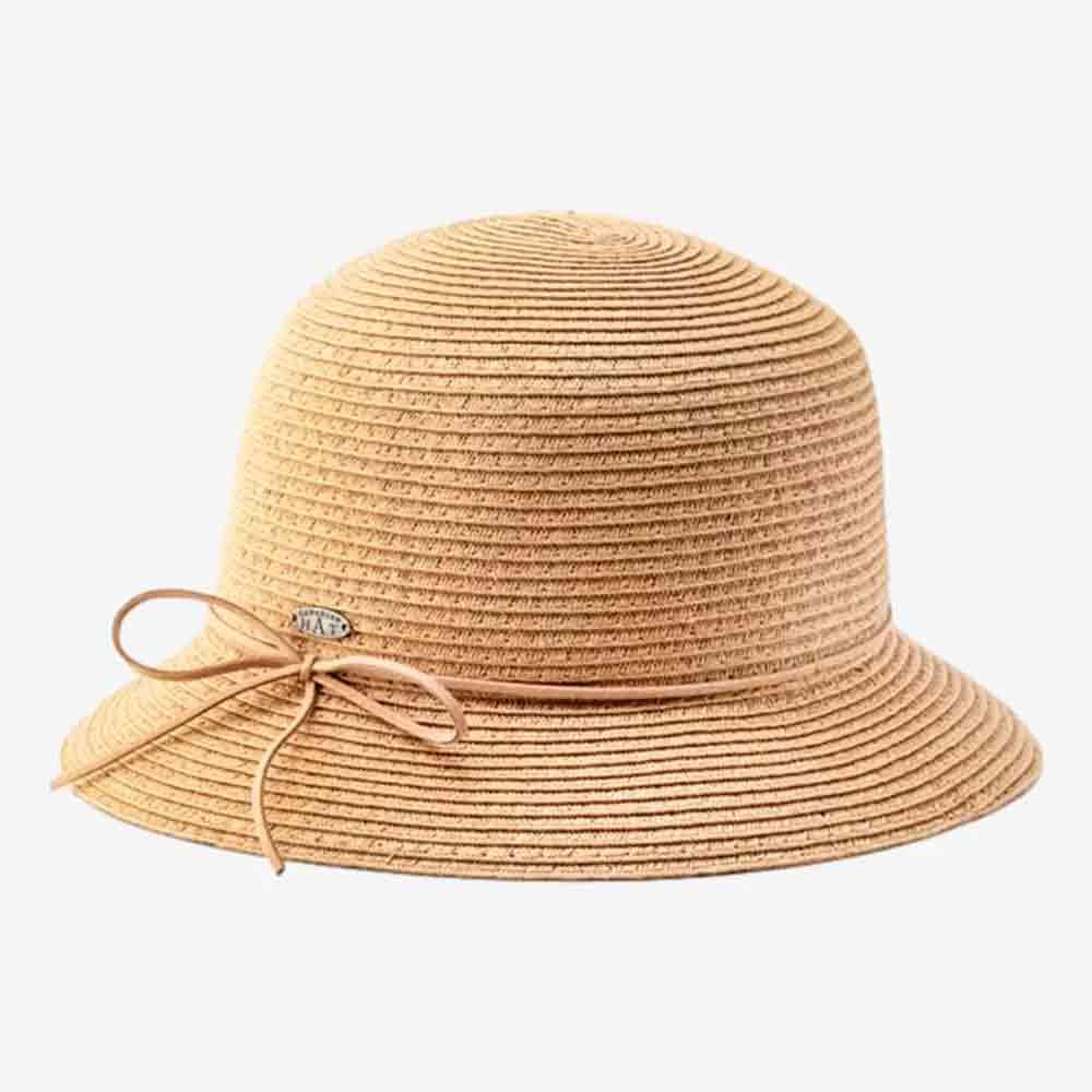 A light brown, woven straw cloche hat with a round crown and narrow brim, featuring a thin decorative bow and small metal accent—perfect as a thoughtful Mother's Day gift.