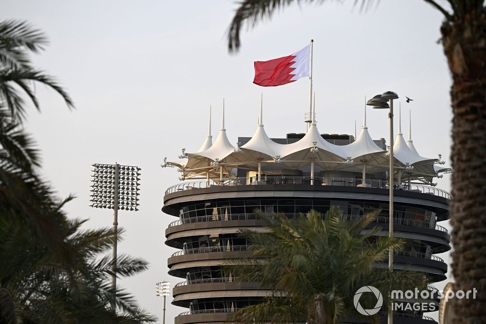 The Bahrain flag flies over the Sakhir Tower